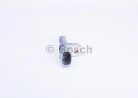 Датчик ABS (задній) VW Caddy 04-/Passat 14- BOSCH 0 986 594 606